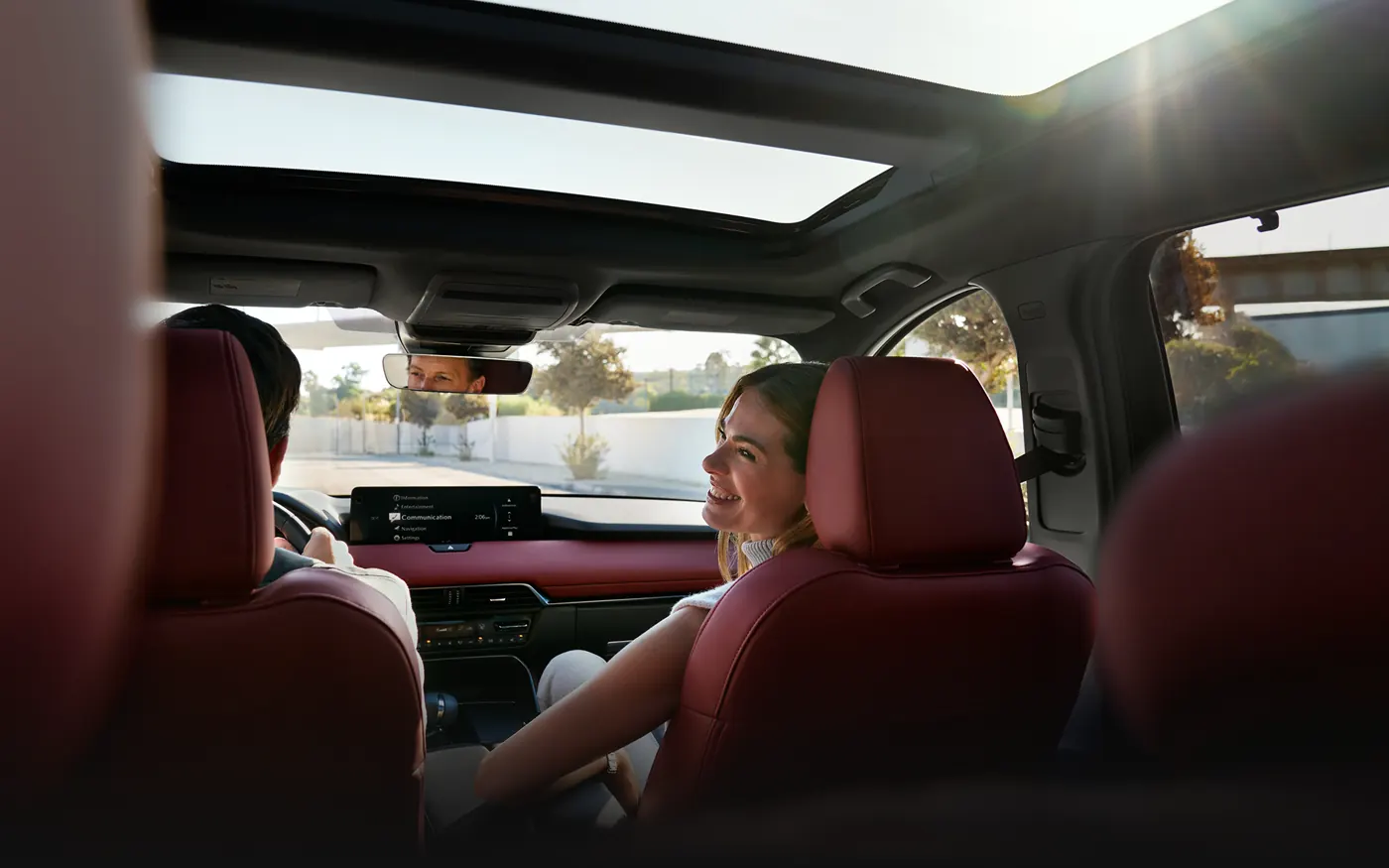 Friends riding in the 2-row 2027 Mazda CX-90 | Russell & Smith Mazda in Houston TX